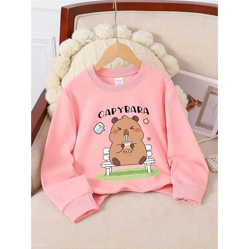 European sizes Crewneck Sweatshirt for Kids Featuring a Capybara Enjoying Bubble Tea While Sitting on a Bench. Perfect for Sports And Casual Outings