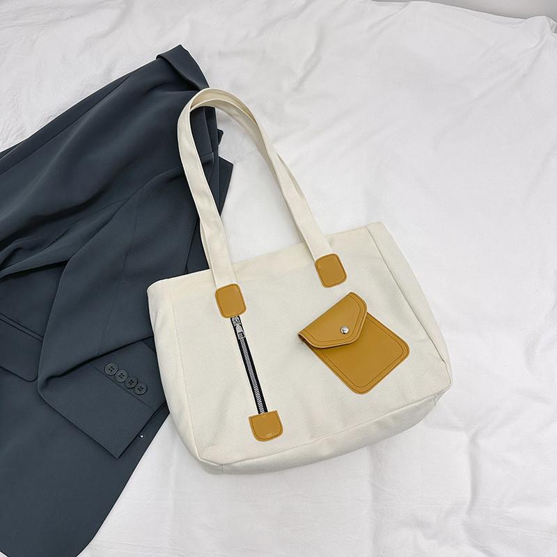 

Korean Canvas Shoulder Bag Large Capacity Street Fashion Tote Bag 2024 Winter New Simple Handbag коричневий