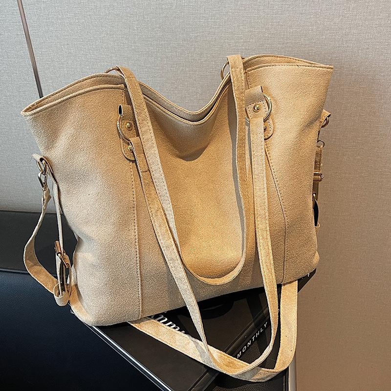 Bolso de cubo de alta gama, nuevo bolso de mano de otoño e invierno, gran capacidad, retro, de cuero suave, bolso de mano de un solo hombro para mujer.