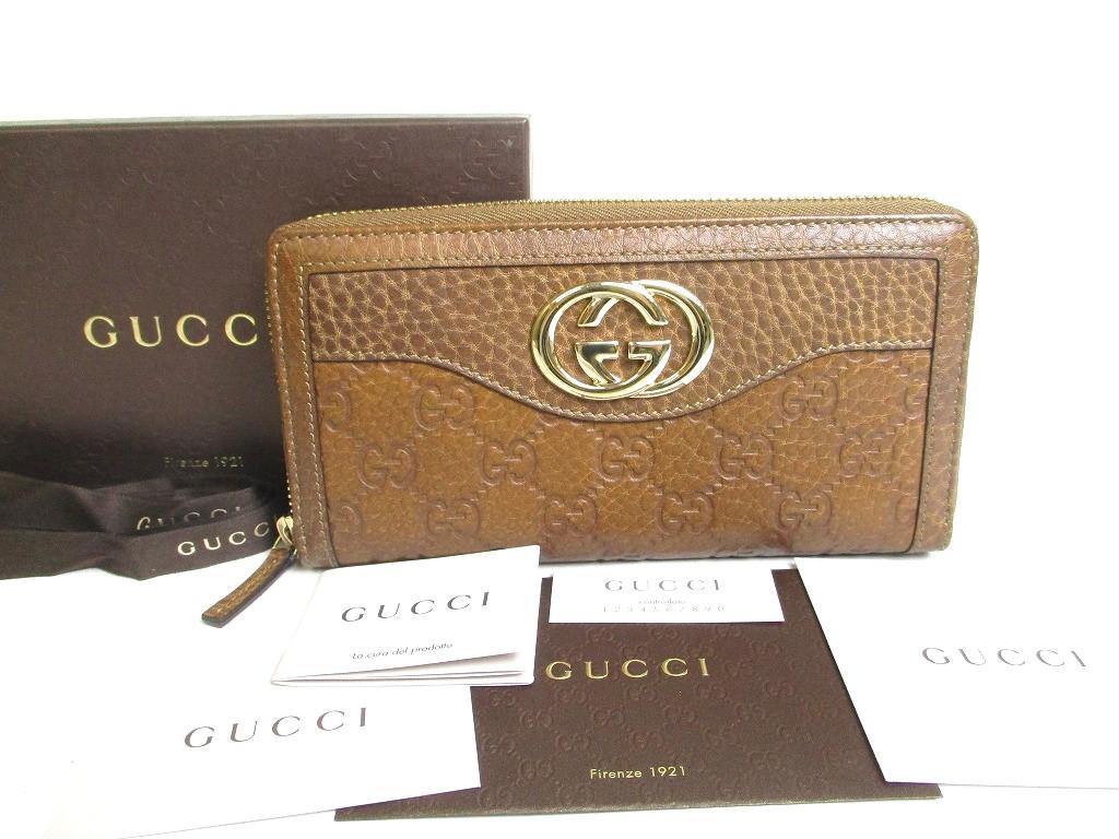 

Автентичний шкіряний коричневий шкіряний гаманець GUCCI G GG на круглій блискавці №a488 відремонтований