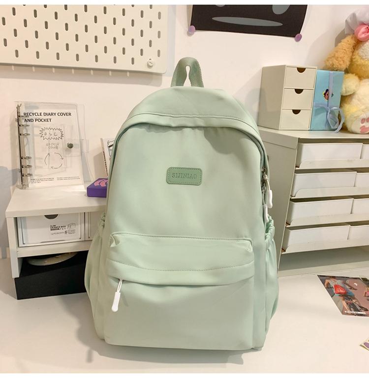 Schoolbag Japanese simple backpack large capacity high sense casual backpack male multi-function solid color female college student schoolbag tide