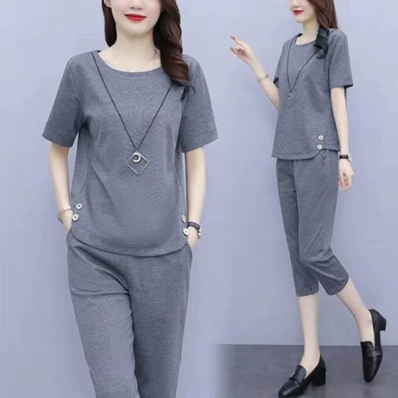 Women's Summer Big Size Leisure Suit Comfortable Thin Short-sleeved Top + Seven Trousers Solid Colour Simple Two-piece