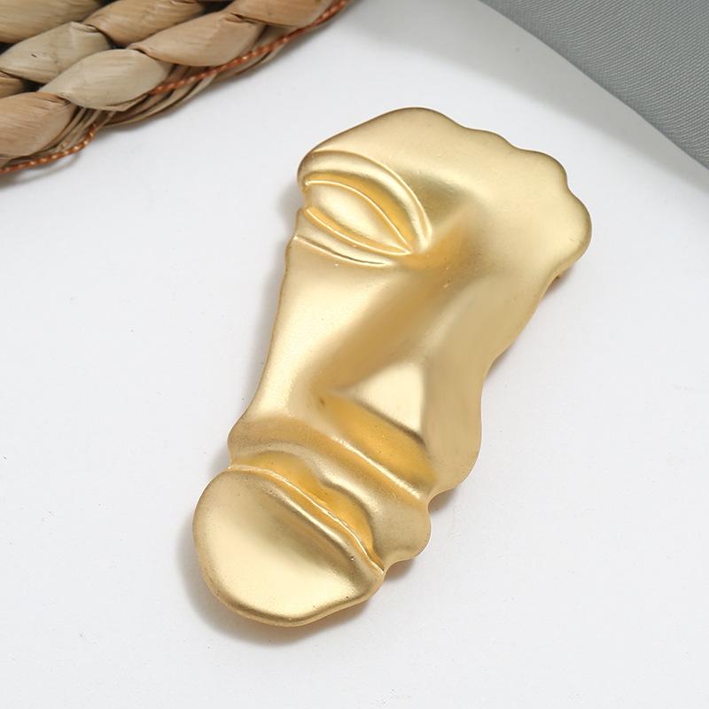 Temperament cold wind calling thousands of people avatar brooch gold half face Internet celebrity women's suit accessories