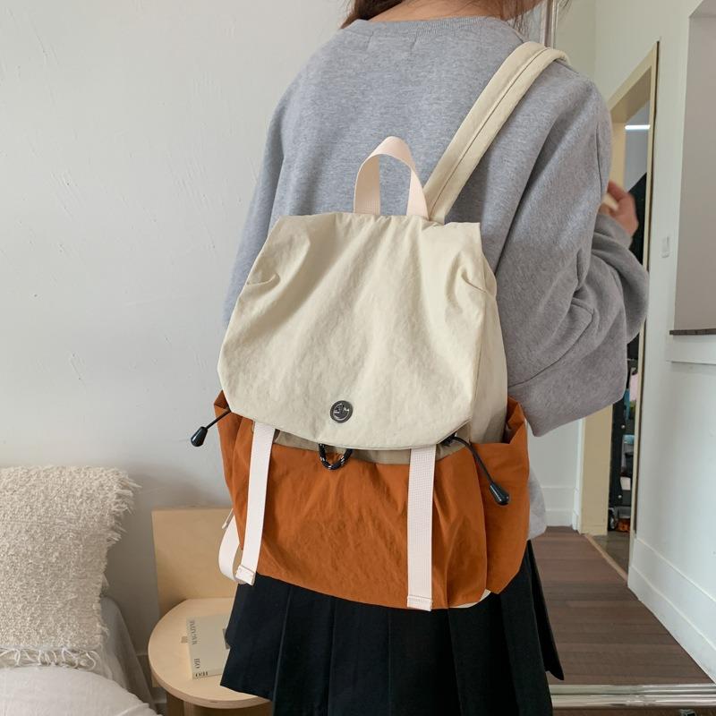 Niche design lightweight cloth bag women's new models, please first large-capacity travel backpack contrasting color backpack