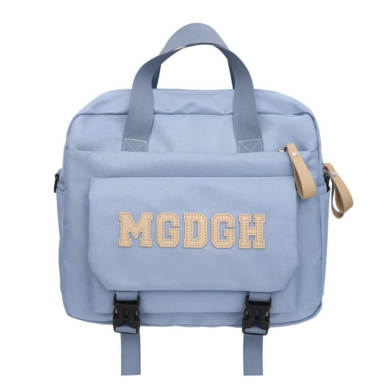 Schoolbag Japanese new solid color simple campus junior high school schoolbag Korean version girl backpack women's large capacity travel backpack