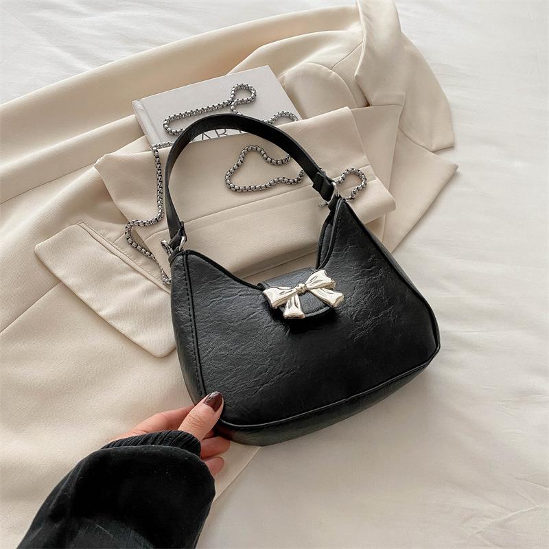 

Сумка через плечо с бантом женская 2024 новая модная корейская версия нишевая сумка подмышками текстура цепочка полумесяц сумка чёрный