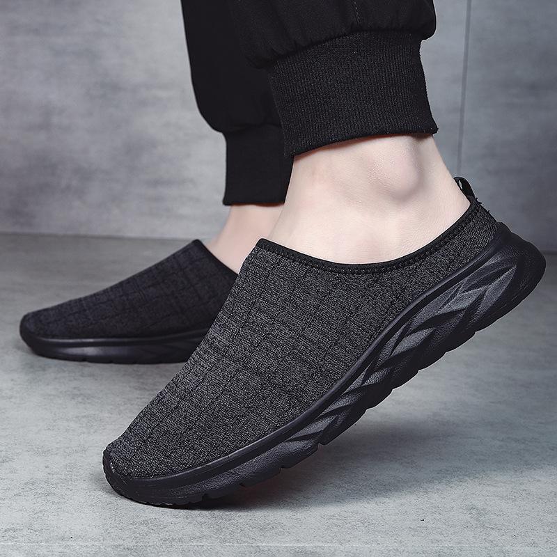 Trendig flugvävd mesh utan häl, halvt stöd, trendiga ultralätta extra stora vardagspappa-skor