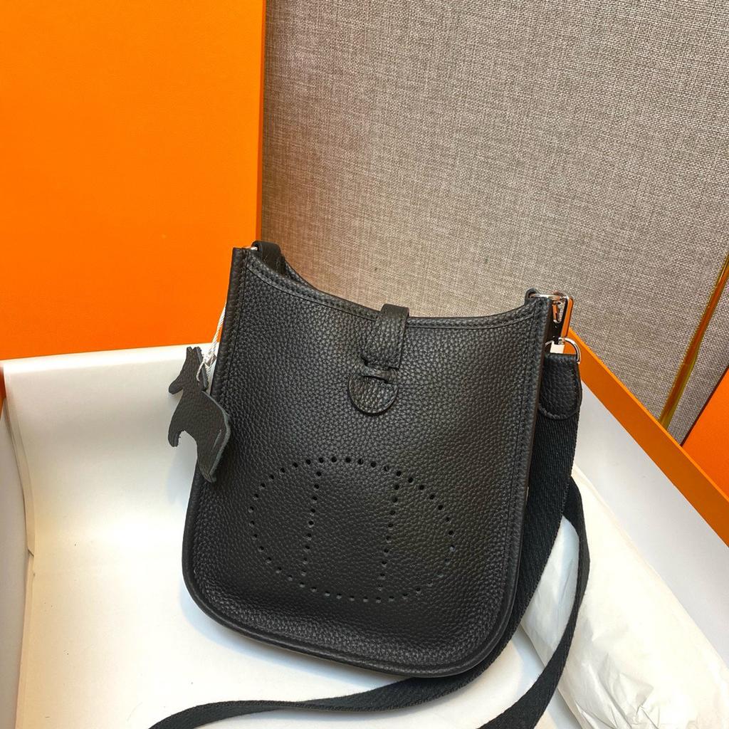 Factory wholesale first layer togo cowhide bucket bag women's bag lychee pattern hollow single shoulder crossbody bag hollow design