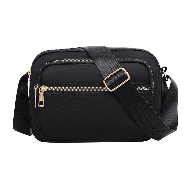 New Oxford cloth bag women's bag lightweight anti-splashing shoulder messenger bag mother bag mobile phone change cashier bag