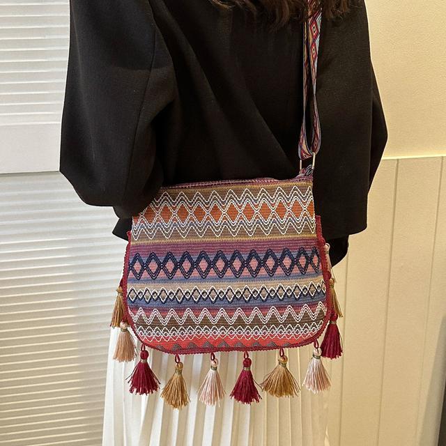 High-value ethnic style messenger bag women's 2025 new trendy versatile wide shoulder strap shoulder bag fringed bucket bag women