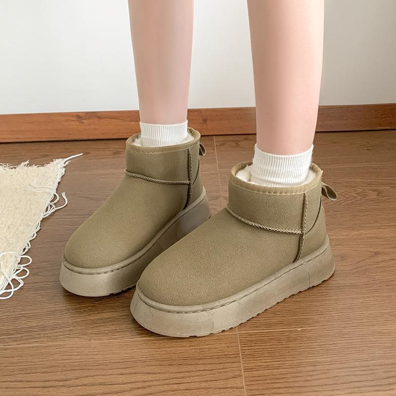 Autumn and winter snow boots women's 2025 new thick-soled thickened thermal cotton shoes with one foot pedal solid color short tube cold-proof boot
