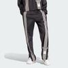 Adidas Pantalón de Chándal de Punto Adibreak Originals con Rayas Laterales y Cintura Elástica para Mujer Negro IS5252