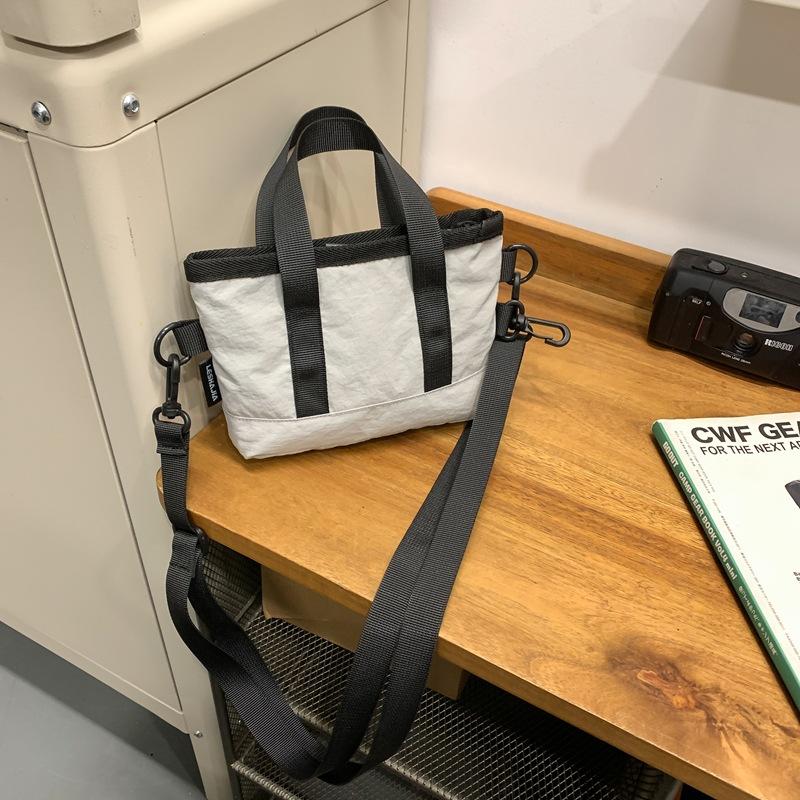 Crossbody bag women's small bag 2025 new foreign style personalized solid color portable simple shoulder bag trendy casual bucket bag