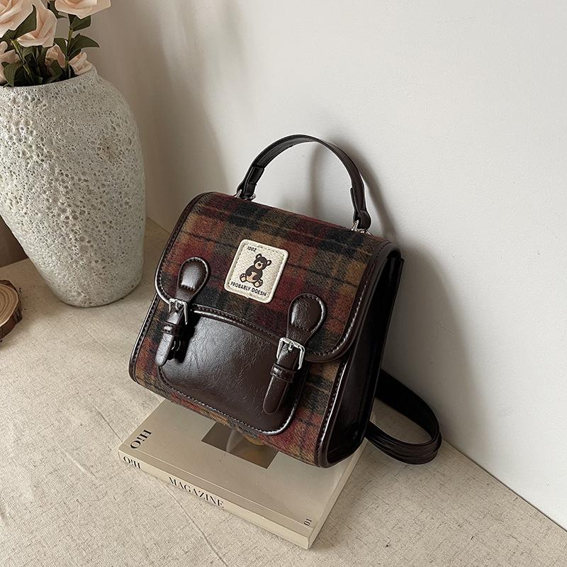 Autumn and winter niche backpack women's new commuter retro versatile backpack mini schoolbag