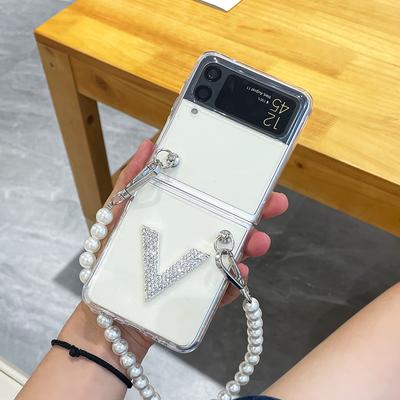 Luxuriöse, glitzernde, transparente Handyhülle für Samsung Galaxy Z Flip 3 5g, tragbares Perlenarmband, schützende Rückseite