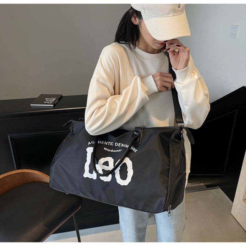 Large capacity cloth bag women's new versatile casual messenger business travel luggage commuter hand-held travel bag