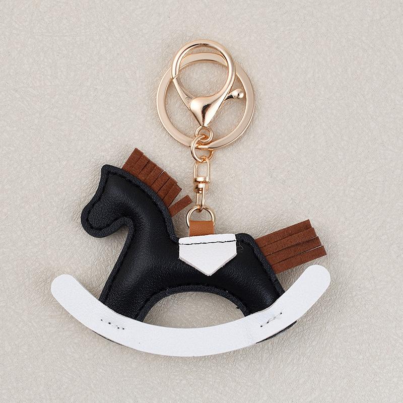 

Personalized custom rocking horse keychain, cute and fashionable children s Trojan horse key pendant, color matching schoolbag pendant. чёрный