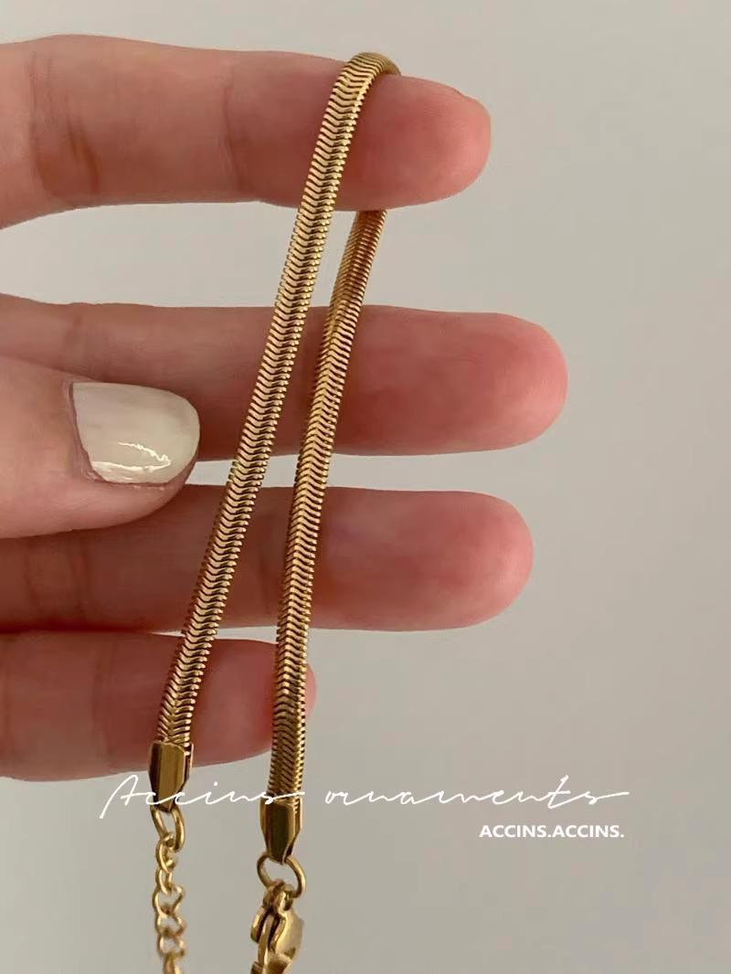 

Золотой Геометричный Минималистичный Ультратонкий Браслет из Титановой Стали Змеиная Кость Унисекс