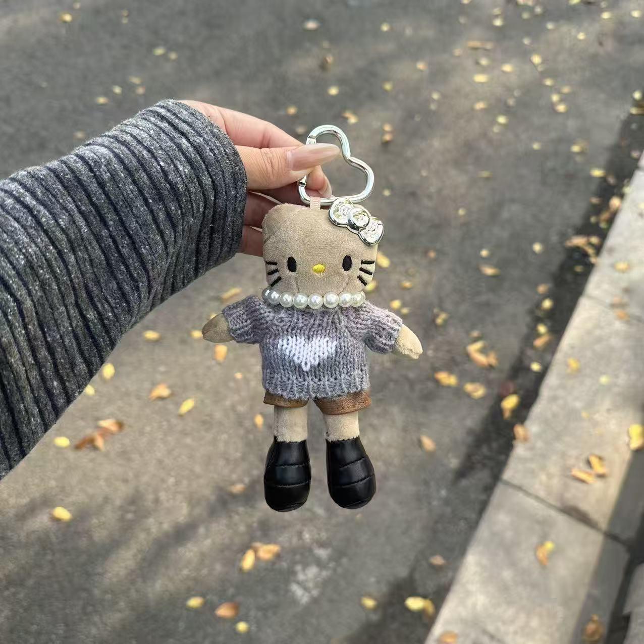 

Sweet Hello Kitty Plush Bag Charm: Long-Legged Cartoon Keychain with Maillard Colors