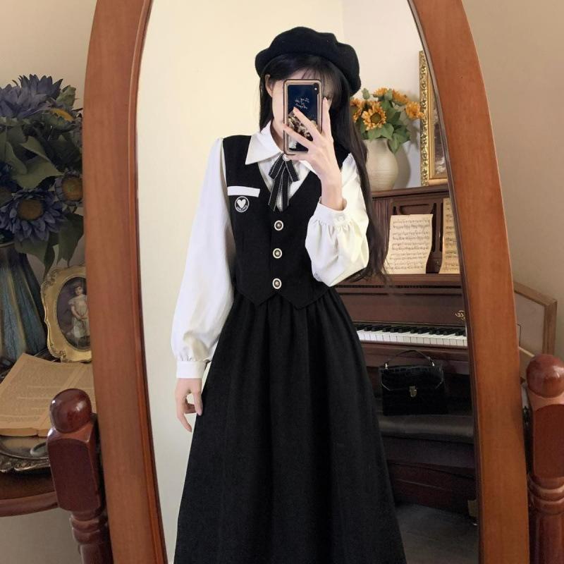 Age reduction long-sleeved college style dress women's clothing autumn and winter new models to cover the belly and show thinness fake two skirts