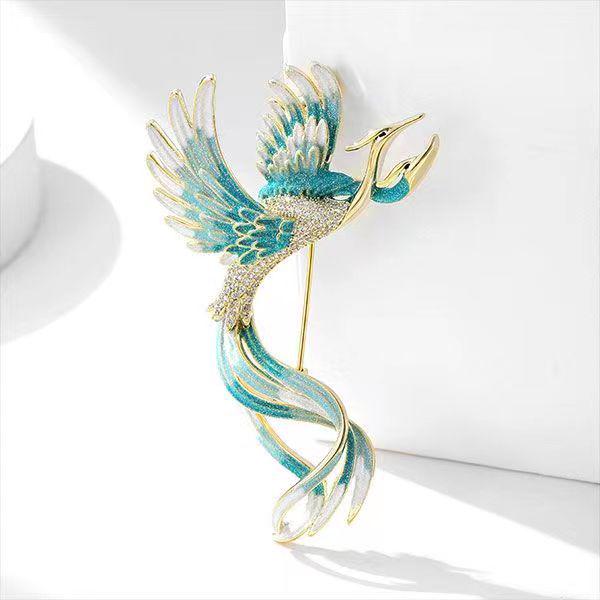 High-End Enamel Brooch: Retro Phoenix Perching on Wutong Tree, Perfect for Women's Cheongsam and Suit Accessories in Ancient Style.