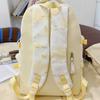The new Japanese ins high-value, fresh, sweet and cute butterfly graffiti backpack, lightweight backpack for junior high school students