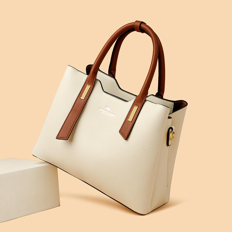 This Fashionable Color-blocking Bag Is Simple Elegant and Stylish for Ladies. It's A Hand-held Shoulder Bag