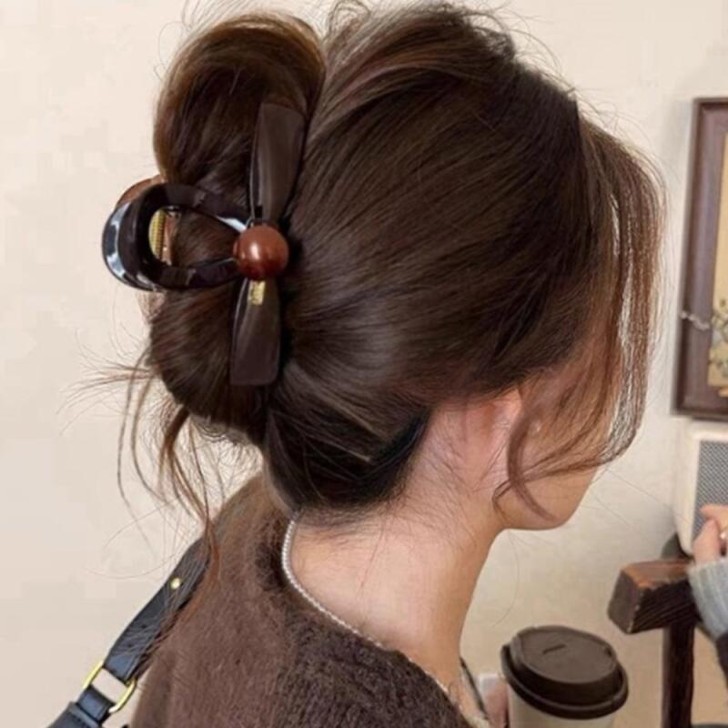 Women s royal ribbon updo with brown hairpin A33618_Single