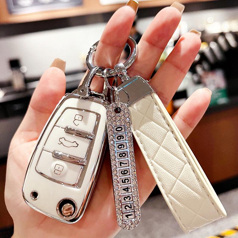 Chery Key Case for Tiggo 3x, Arrizo 5, and QQ Ice Cream - High-End Protective Shell with Buckle for Women.