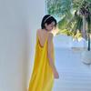 Seaside vacation sexy backless suspender dress women's summer new loose a-word skirt gentle yellow long skirt