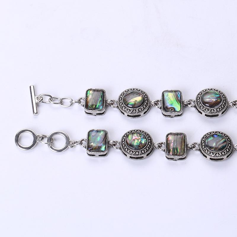 Nueva pulsera de concha natural con hebilla ajustable de tres vueltas, moderna y retro.