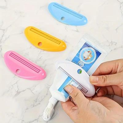 Kompaktní ruční mačkadlo na tuby na zubní pastu, krém nebo čisticí prostředek