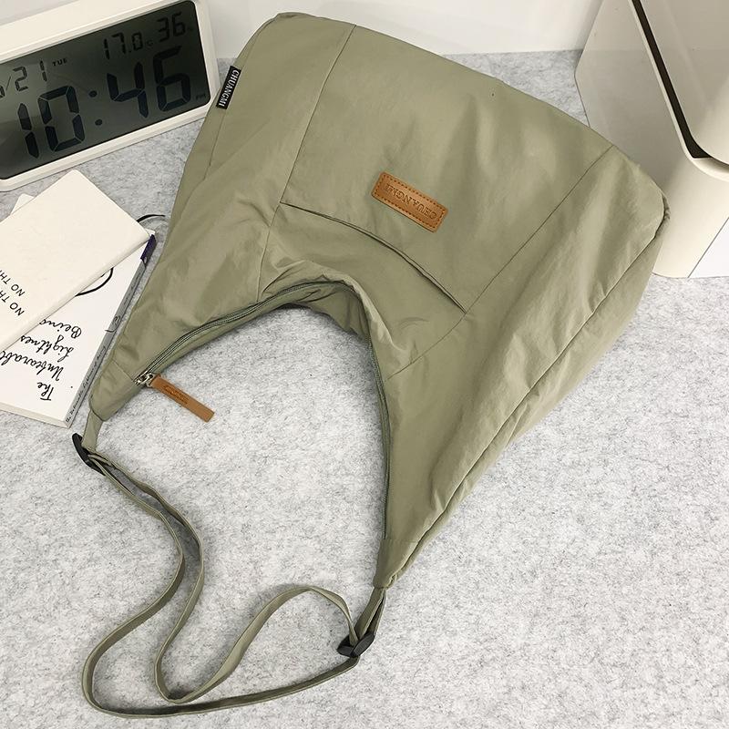 

Summer Women s Bags for Women s New Dumpling Bags for Men s Commuting Shoulder Bag Letters One Shoulder Crossbody Bag