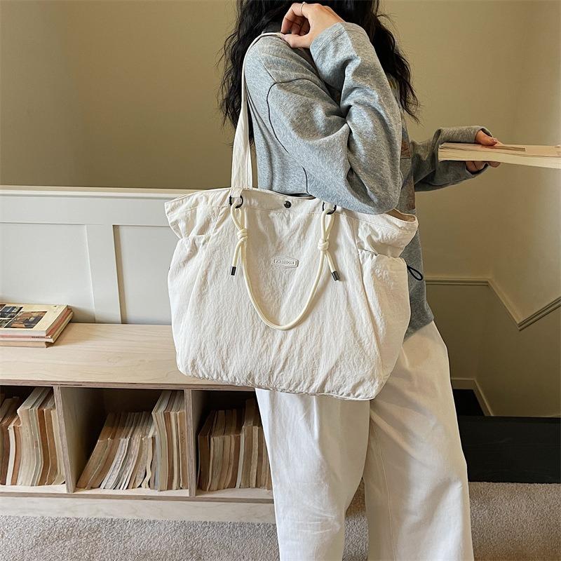 Japanese solid color nylon shoulder bag new large-capacity casual tote bag versatile foreign style student make-up bag