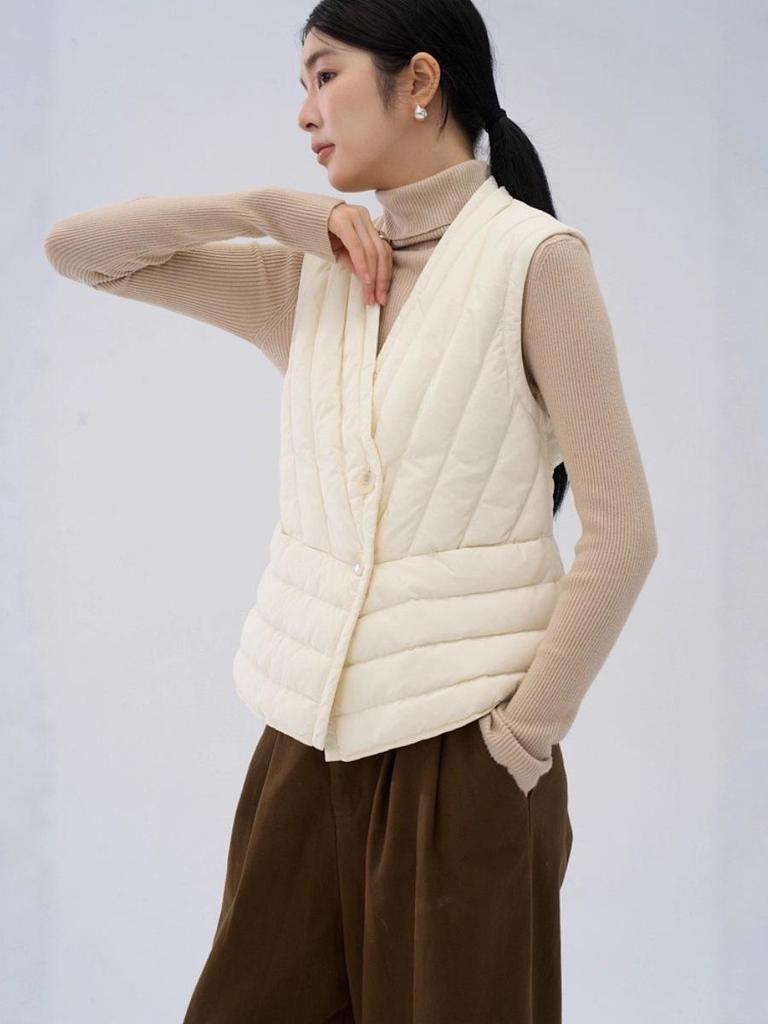 Gilet sans manches léger en duvet à col en V pour femme - 90% duvet, sans manches, amincissant, pour l'automne et l'hiver.