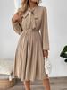 Elegant Pleated Skirt Dress with Bow Tie Collar and Puff Sleeves