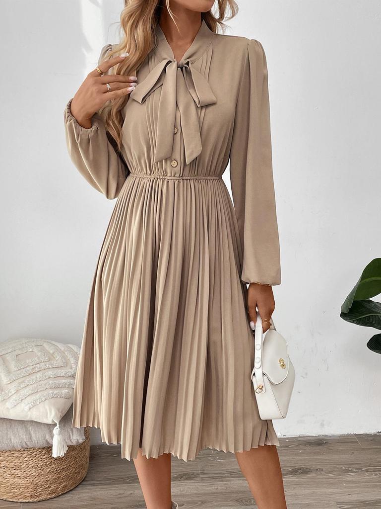 Elegant Pleated Skirt Dress with Bow Tie Collar and Puff Sleeves