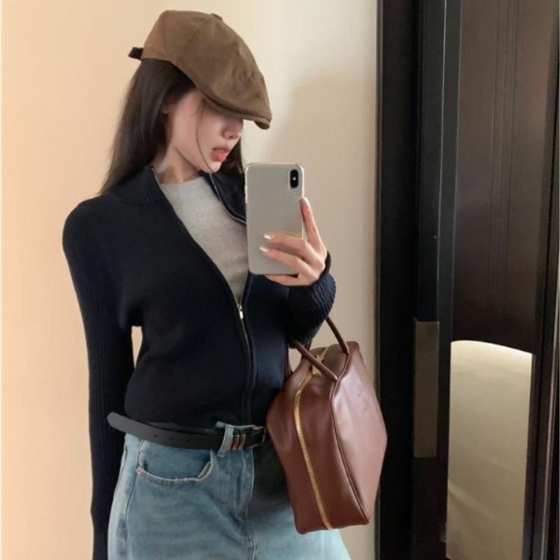 Eine Strick-Cardigan-Jacke mit halbhohem Kragen für Damen im Frühherbst mit Reißverschlussdesign, ein schlankes Kurzarm-Oberteil