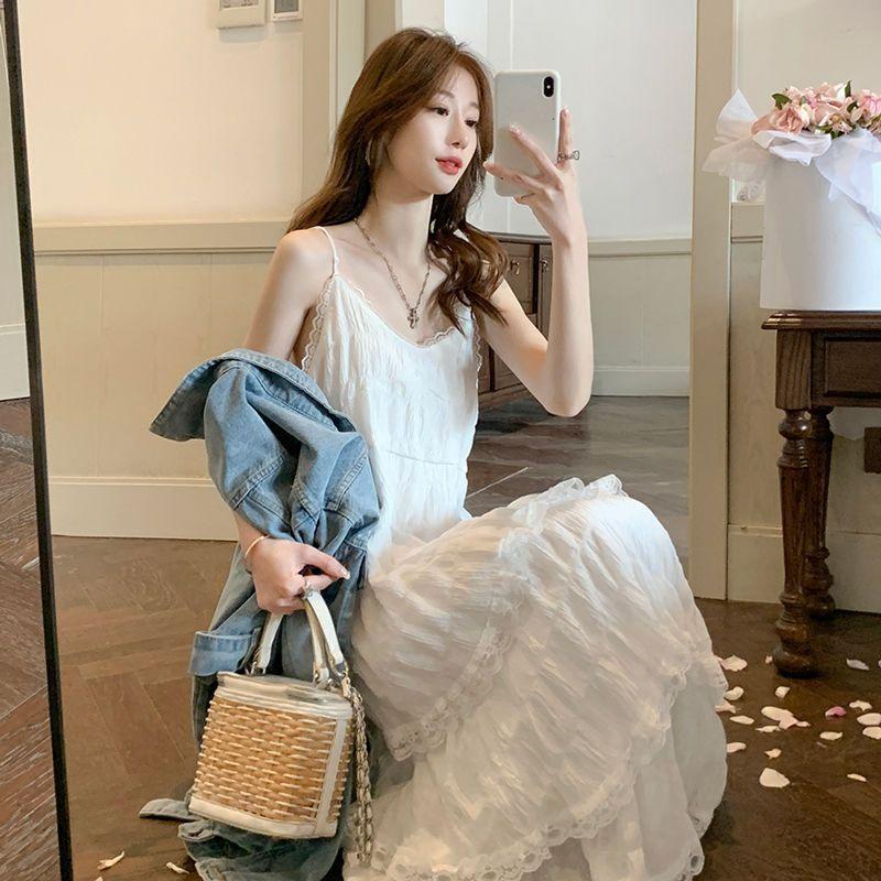 White Dress Women's Summer 2026 New Seaside Vacation Beach Skirt Pure Desire Temperament Sleeveless Suspender Long Skirt