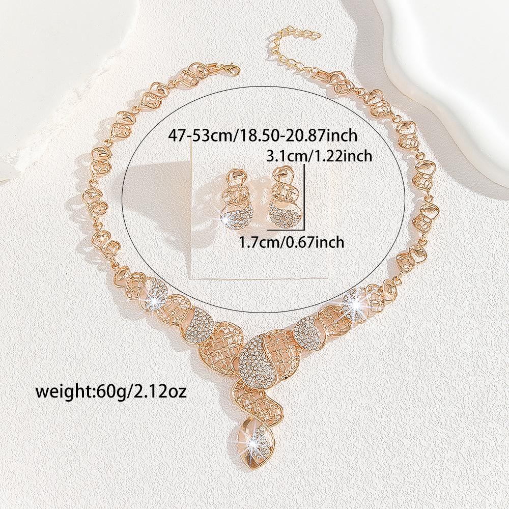 Gold Zinc Alloy Inlaid White Rhinestone Hollow Necklace Earrings Set Women's Jewelry