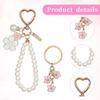 Piriuuo 2 Pcs Cute Pearl Keychains for Women, Flower Keychain Kit Imitation Pearl Chain Key Chain Golden Car Key Chain Flower Keychain Charm for