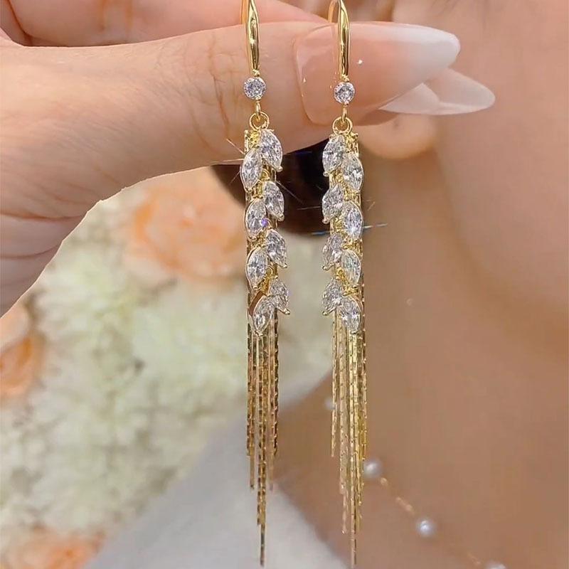 New SuiSui Ping An Fashionable Charm Tassel Earrings with Light Luxury and Super Flash Design Sense, Face Slimming Earrings