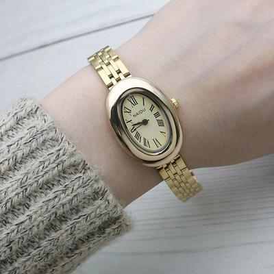 Montre ovale à quartz romain pour femme avec bracelet en acier inoxydable - Style Mori tendance en or