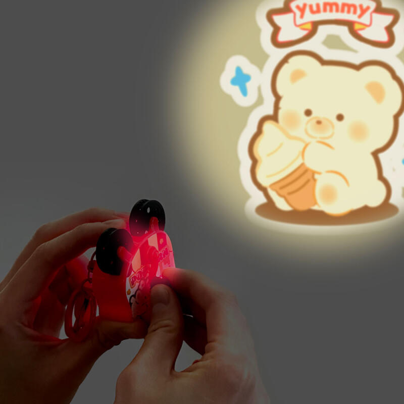 1 box of popcorn projector keyrings (6 pieces)