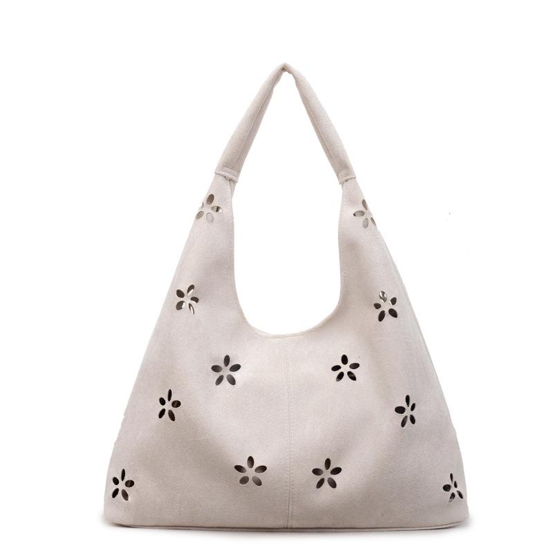 New bag women's casual hollow shoulder bag women's commute to work underarm bag literary and artistic fan tide