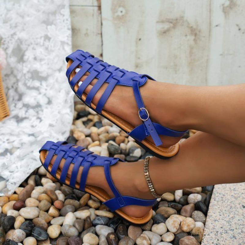 Baotou sandals women's summer new flat-bottomed buckle fashionable large-size beach sandals women