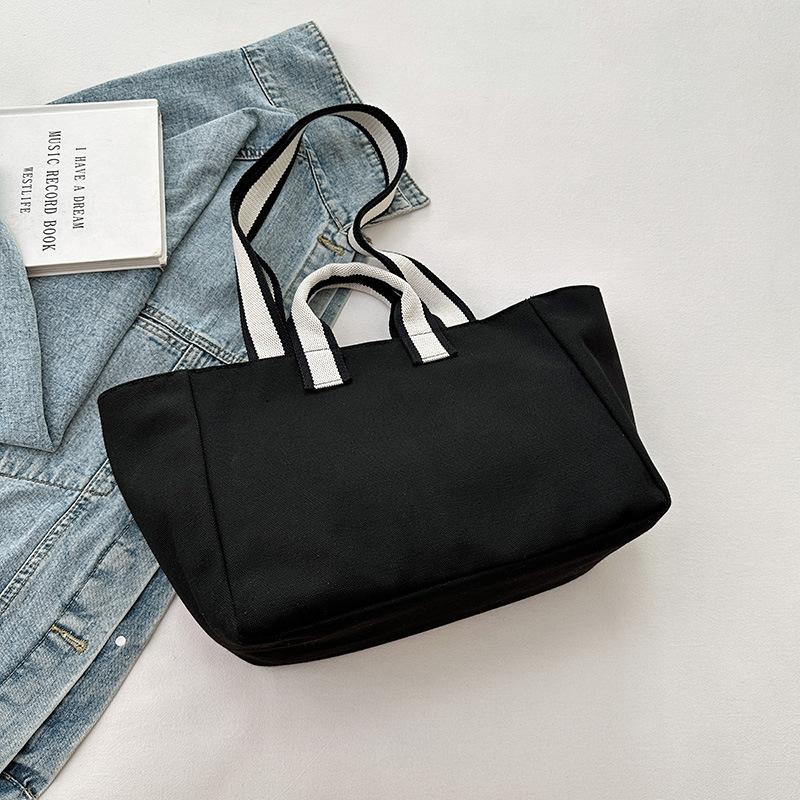 Shoulder bag women's 2025 autumn new trend large-capacity tote bag fashion simple college style commuter canvas bag