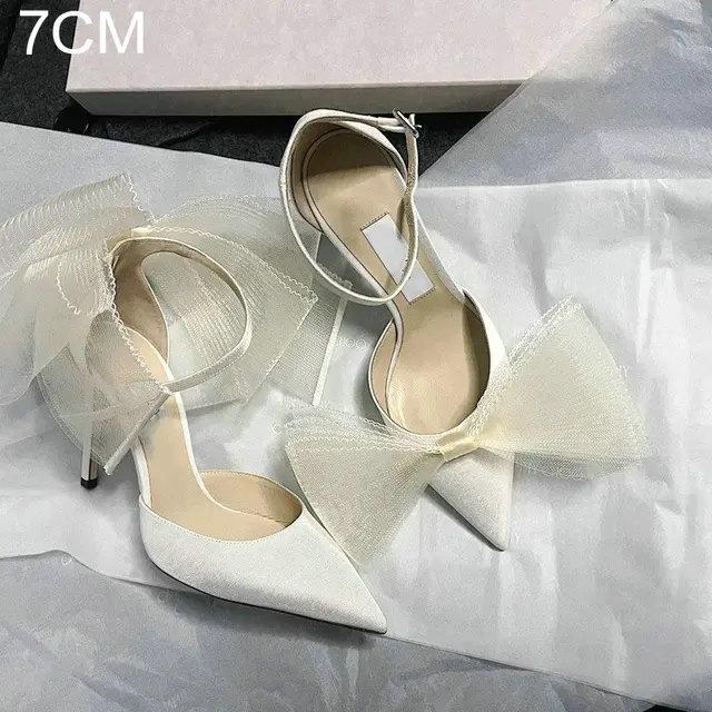 

Fashion 2025 Summer New Bow-knot Pointed High-heeled Pumps Women s Stilettos With Shallow Mouth Ladies Fairy Wind One Word Belt Sandals 40