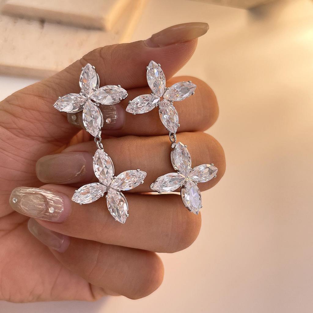 Light Luxury Double Cross Four-Leaf Clover Zircon Earrings in Gold-Plated Copper.