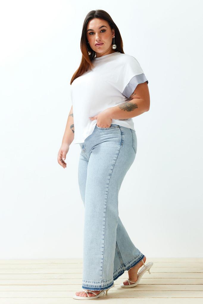 Jeansi de damă stil plus size, albastru deschis cu blocuri de culoare, croială largă